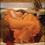 Woman in orange dress asleep on couch