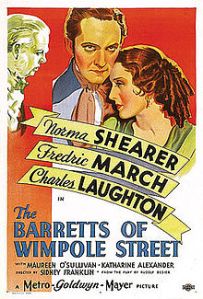 MGM poster of Norma Shearer, Frederic March and Charles Laughton