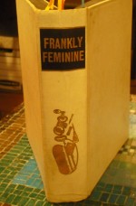 Cover of Frankly Feminine, spine facing